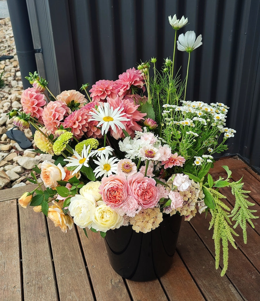 DIY bucket of Earth-friendly Flowers